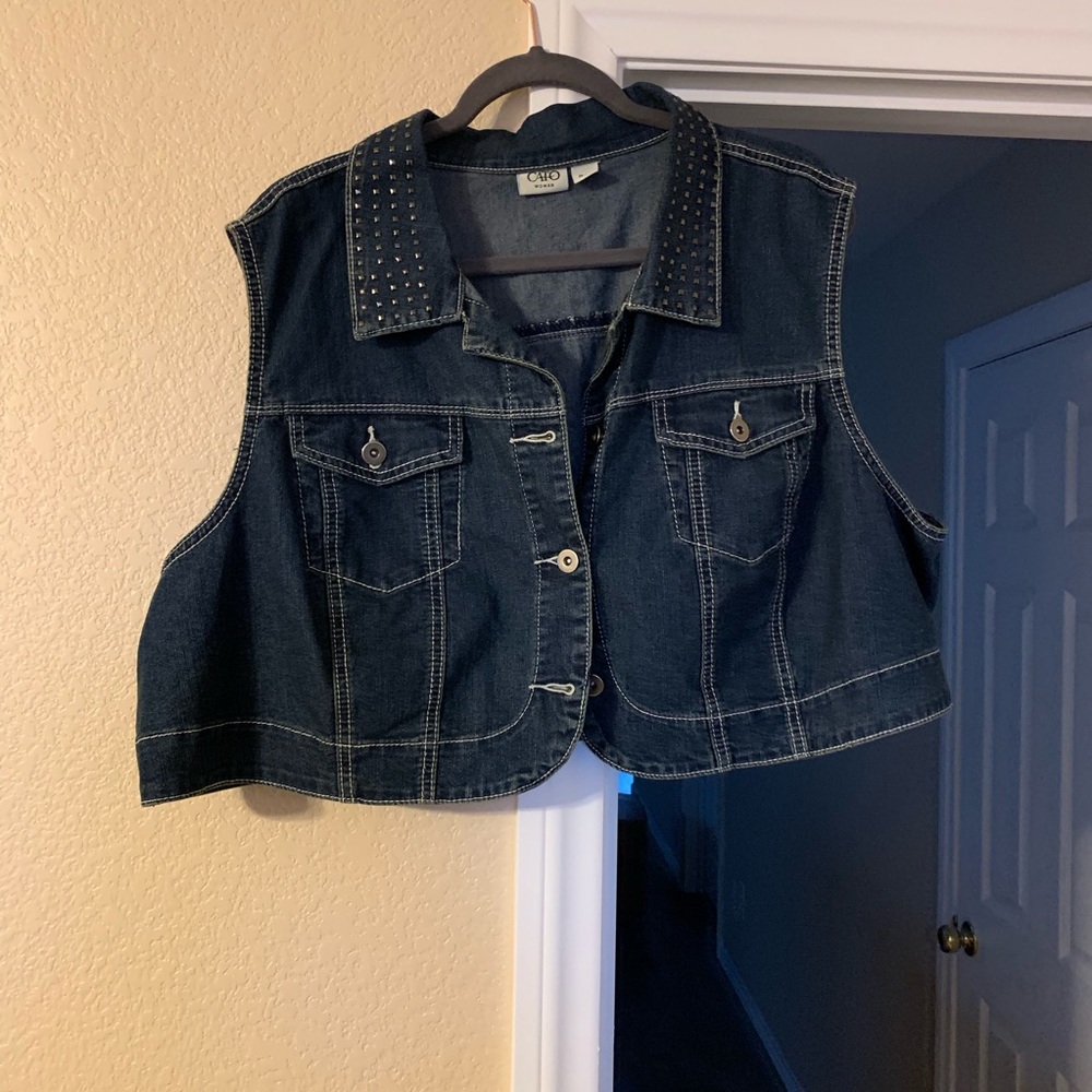 Cropped denim vest.